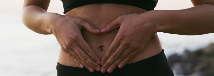 Blog of Understanding Bile Salt Malabsorption: Symptoms and Treatments which have image Heart-shaped hands over stomach symbolizing gut health